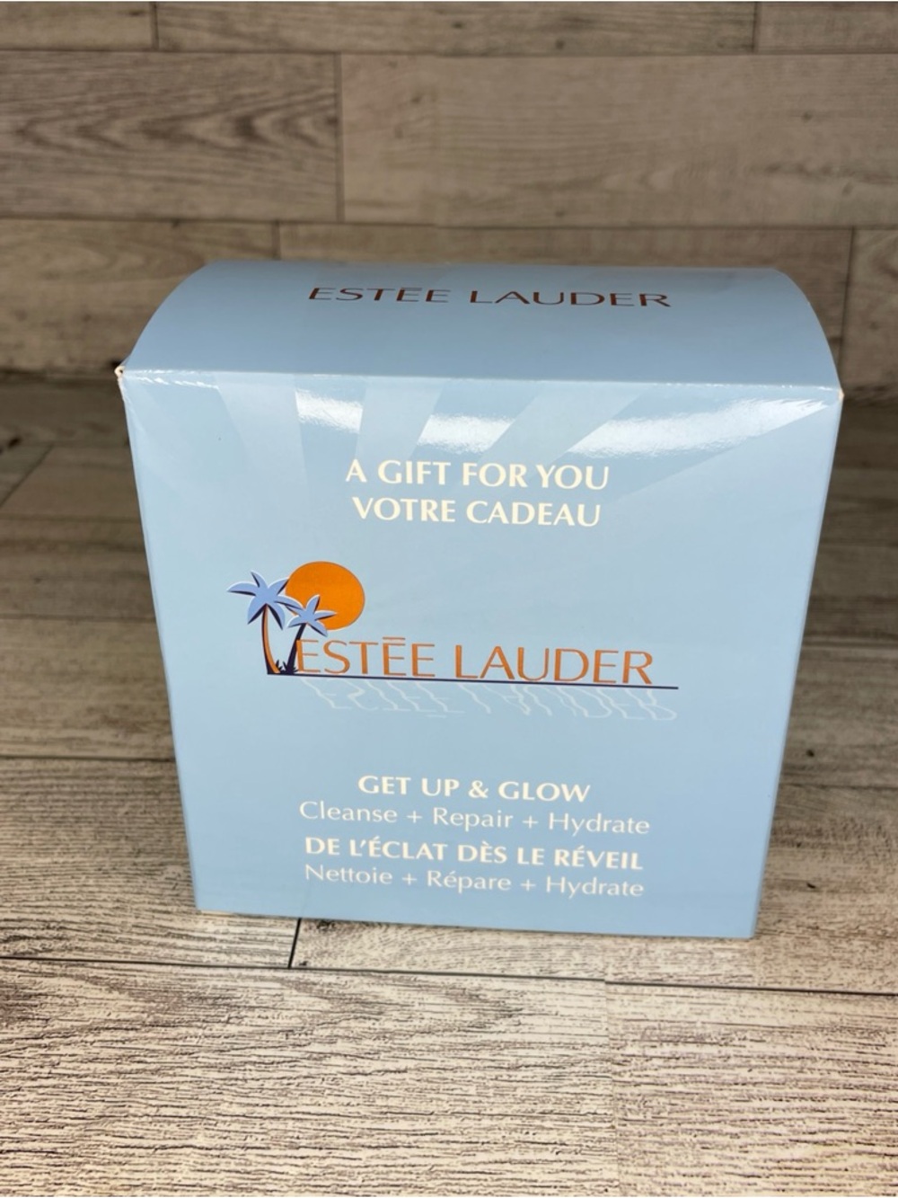 Estee Lauder Get Up & Glow Cleanser Set - Light Blue and Orange Accents
